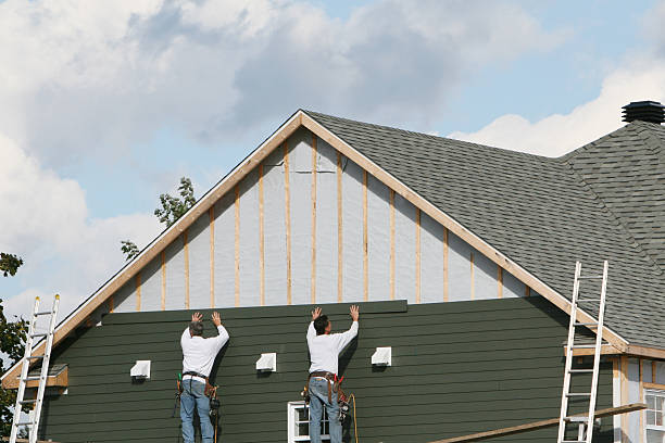 Professional Siding Contractor technician working in Weems, VA